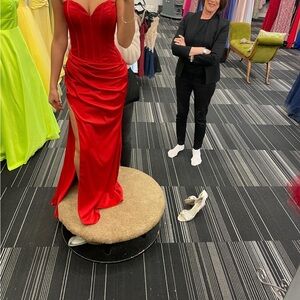 Red Nina Canacci prom dress
